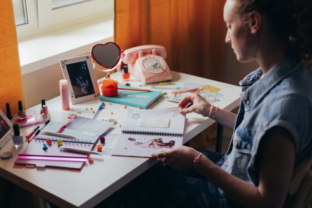colorful journaling stickers arranged on open notebook pages